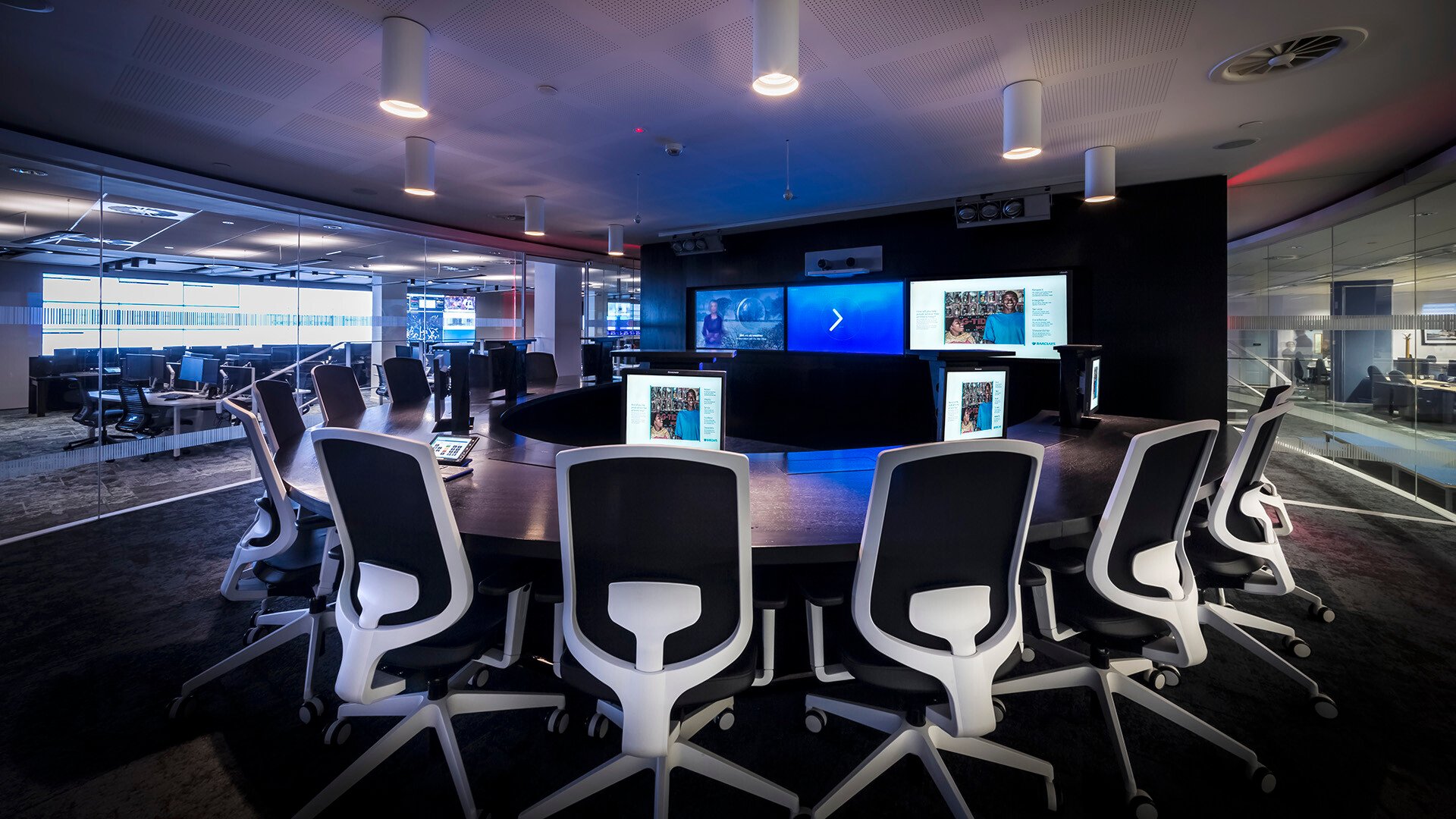 An inside look at the Barclays Global Command Centre, showcasing a high-tech environment with advanced monitoring systems and real-time data displays.
