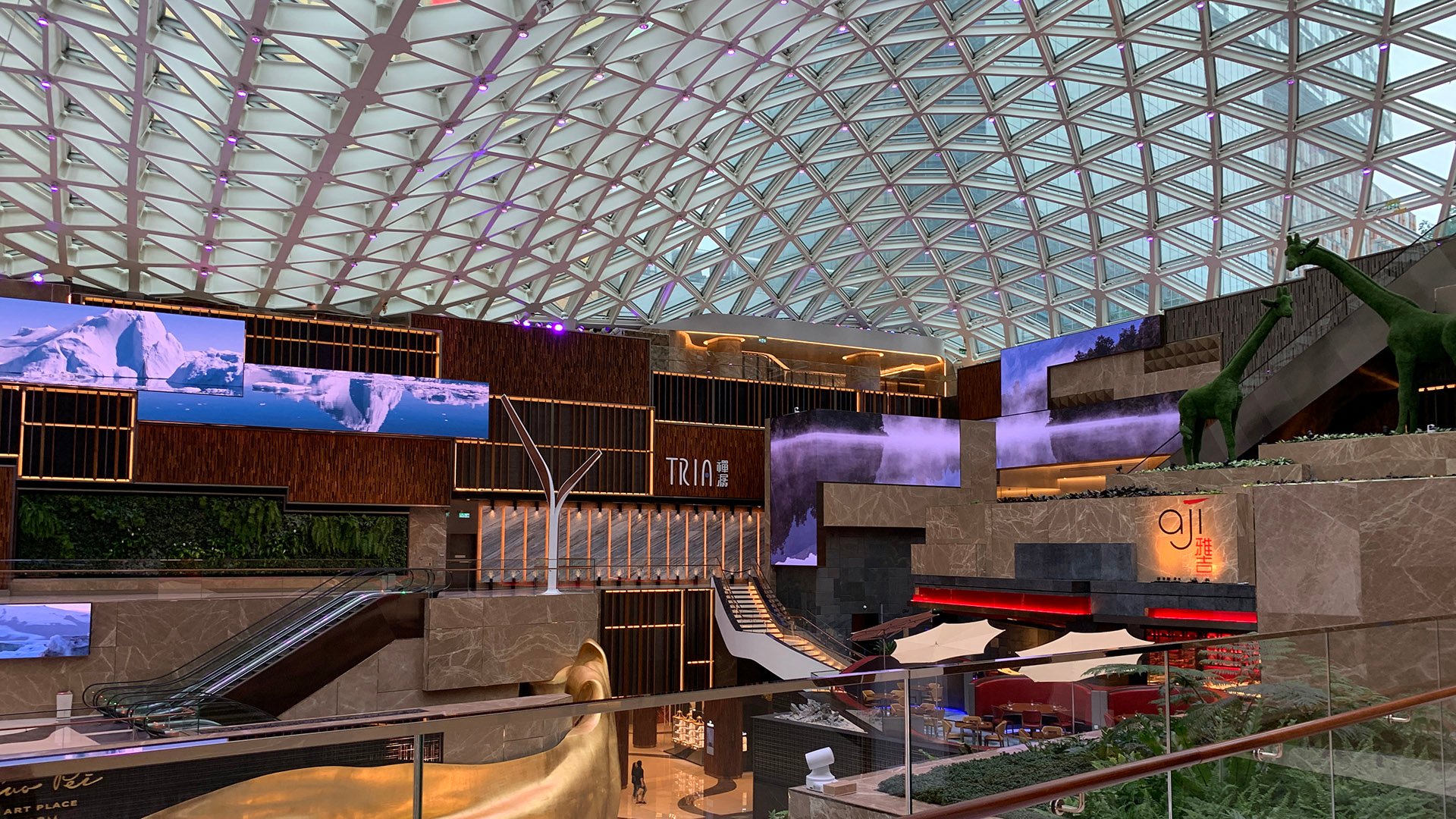 The MGM COTAI Spectacle is a stunning architectural marvel featuring a vast geometric glass dome.