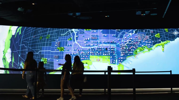 A guest viewing the curved projection wall at Chicago Skydeck.